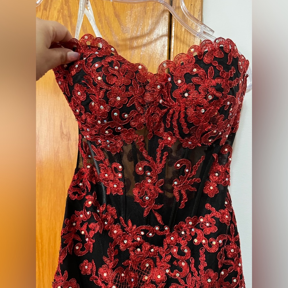Red and black Mermaid style Prom Dress from Peaches Boutique in Chicago